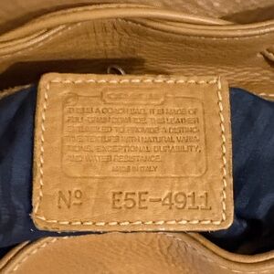 Coach Tan Leather women’s and men’s bags.